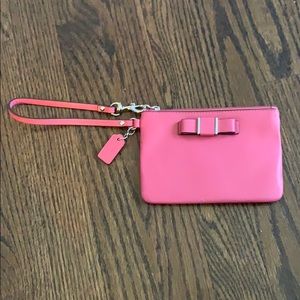 pink Coach wristlet